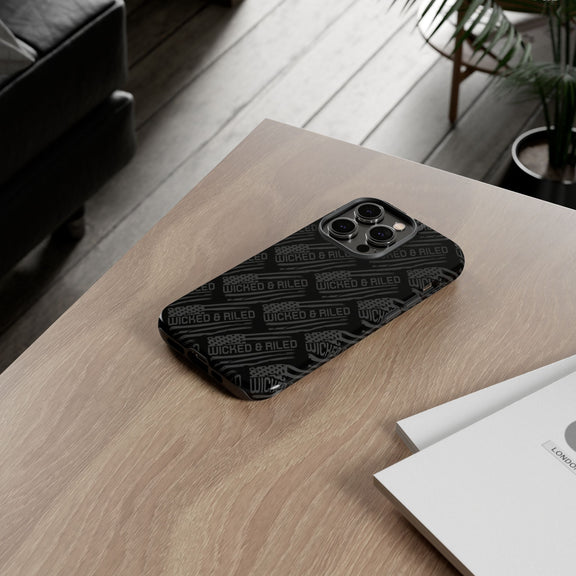 Rugged black protective phone case with TOUGH CASES text pattern by Printify, showcasing durable design and textured surface.