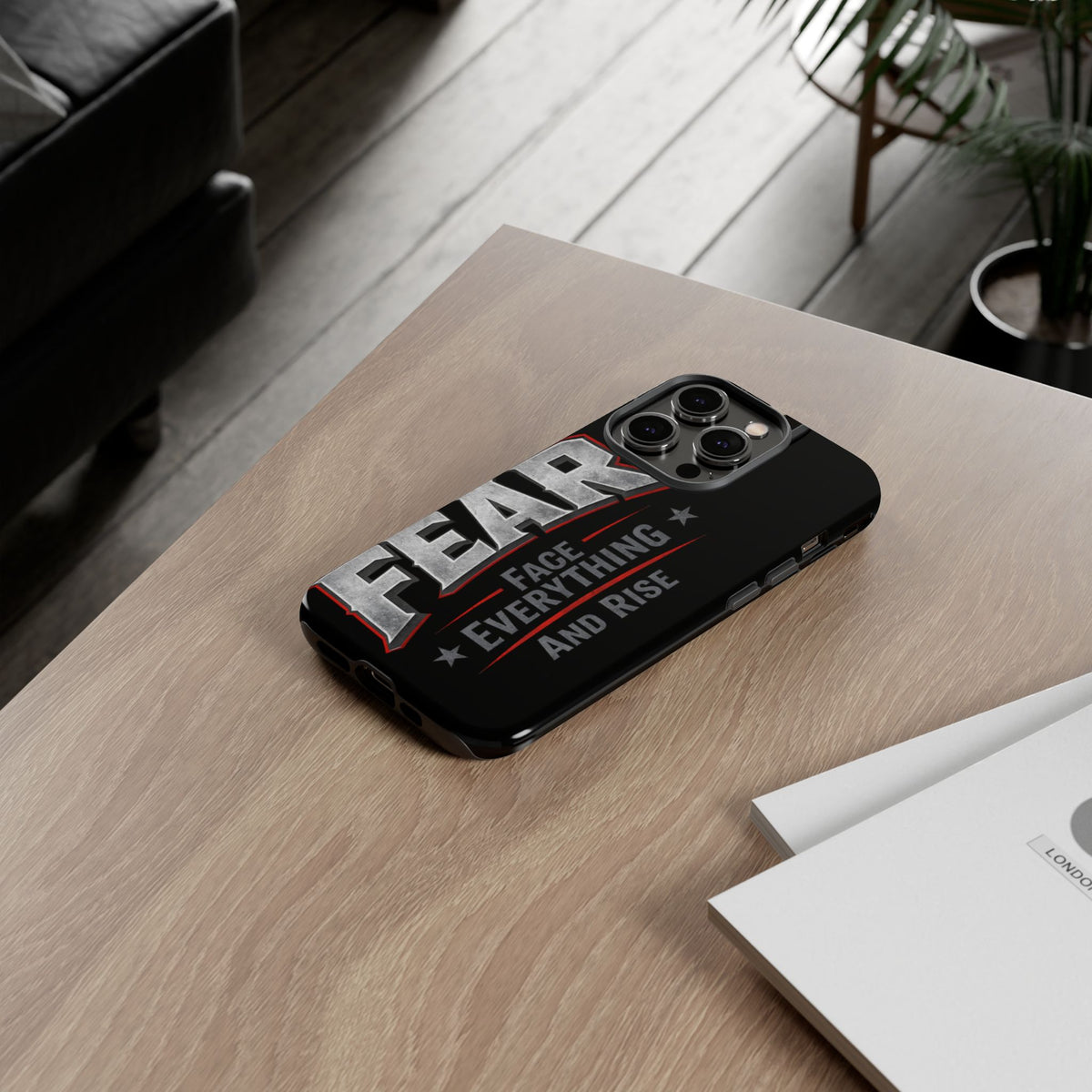 Fear Phone Case by Printify featuring a motivational design with the phrase "Face Everything and Rise" on a sleek background.