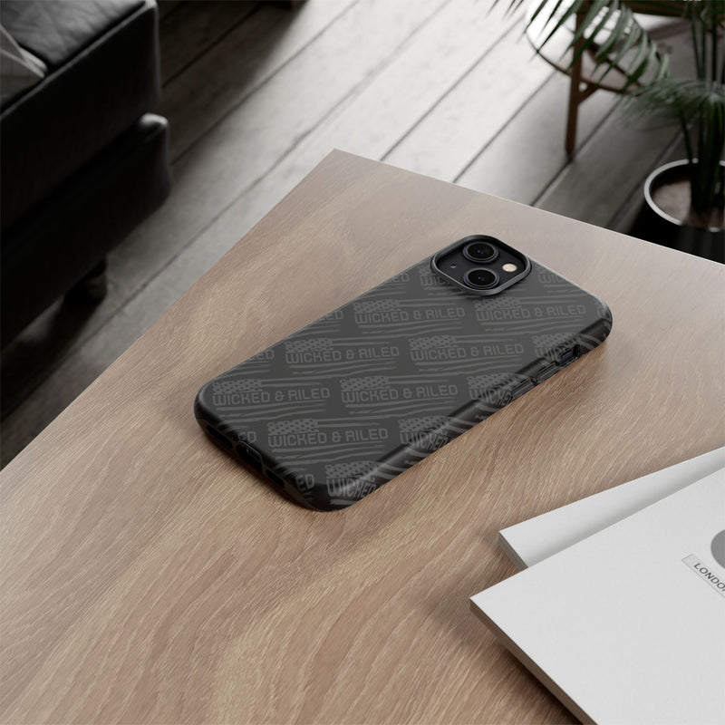 Rugged black protective phone case by Printify with a textured "TOUGH CASES" pattern for enhanced grip and durability.