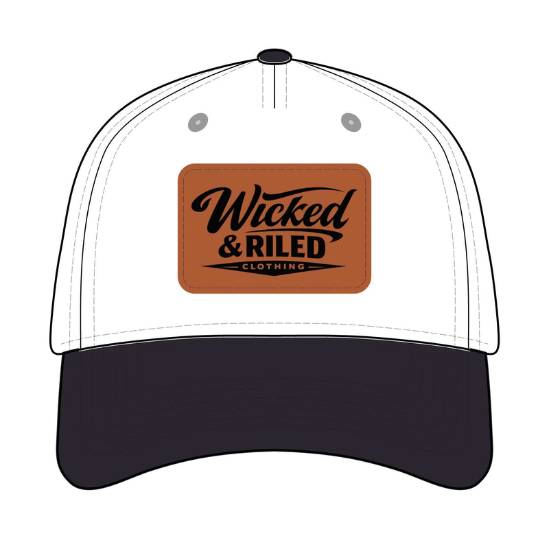 Wicked & Riled leather patch baseball cap featuring a distressed American flag logo.