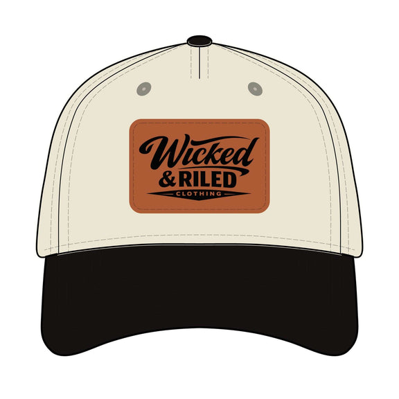 Wicked & Riled leather patch baseball cap featuring a distressed American flag logo on a dark background.
