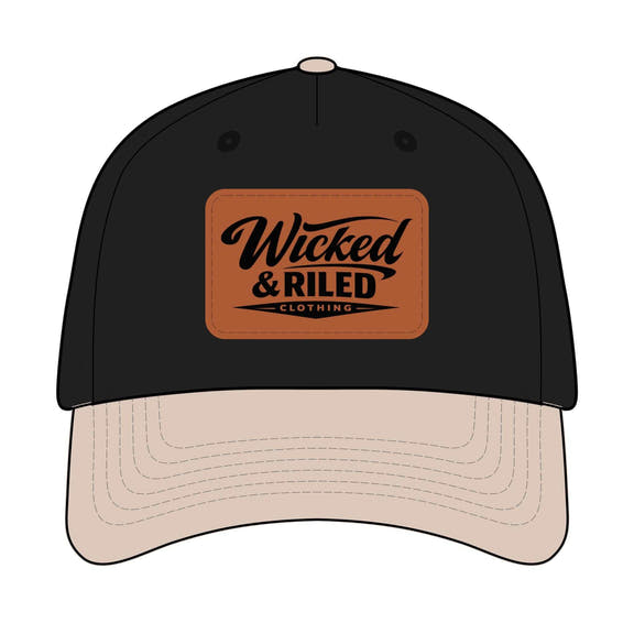 Wicked & Riled leather patch baseball cap featuring a distressed American flag logo on a dark background.