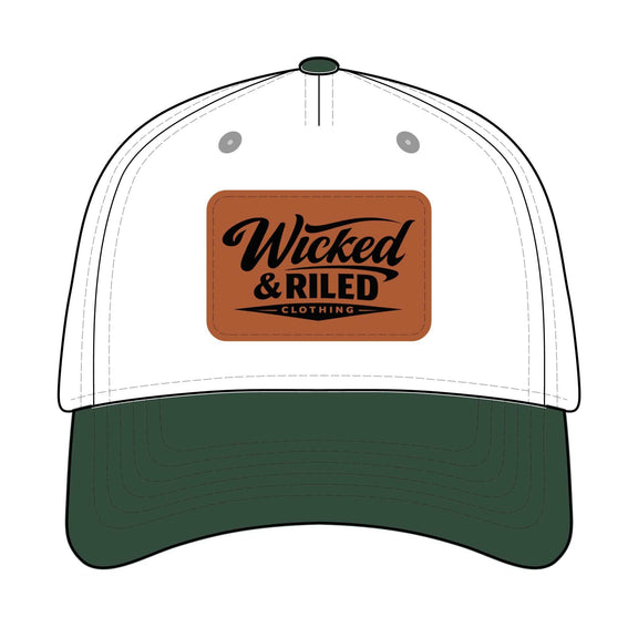 Wicked & Riled distressed leather patch baseball cap featuring American flag logo on a dark background.