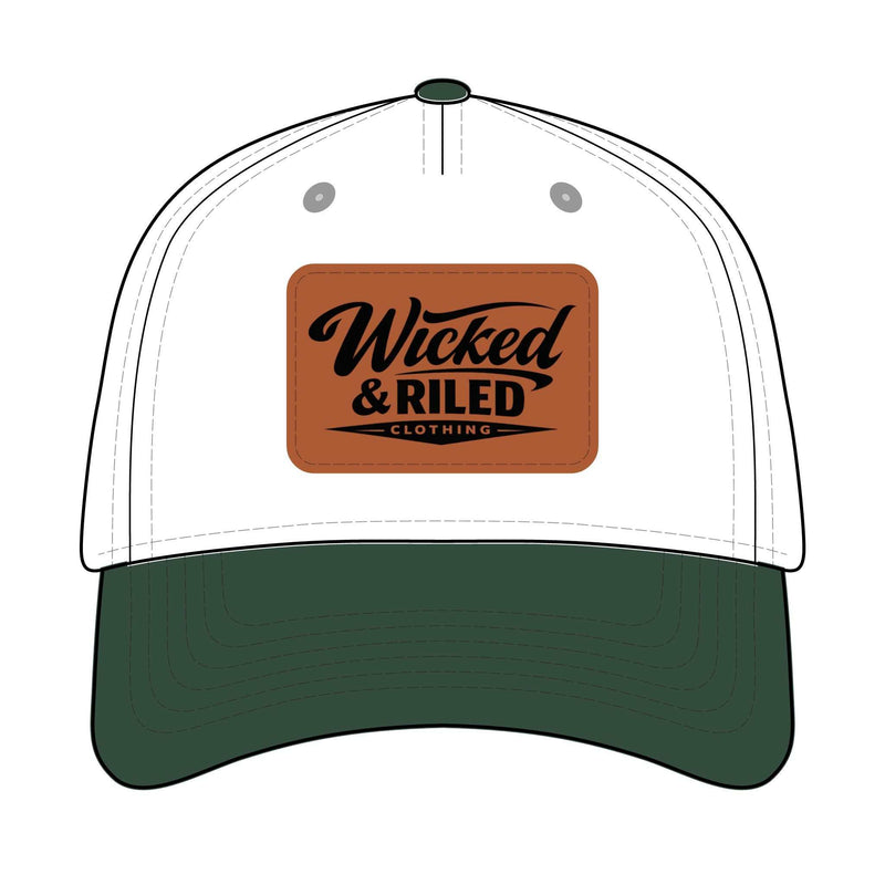 Wicked & Riled distressed leather patch baseball cap featuring American flag logo on a dark background.