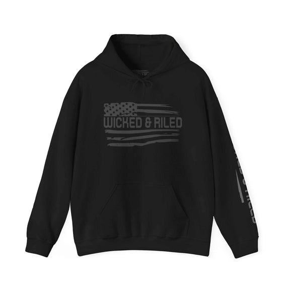 Distressed American logo on a Wicked & Riled pullover hoodie in a casual setting.