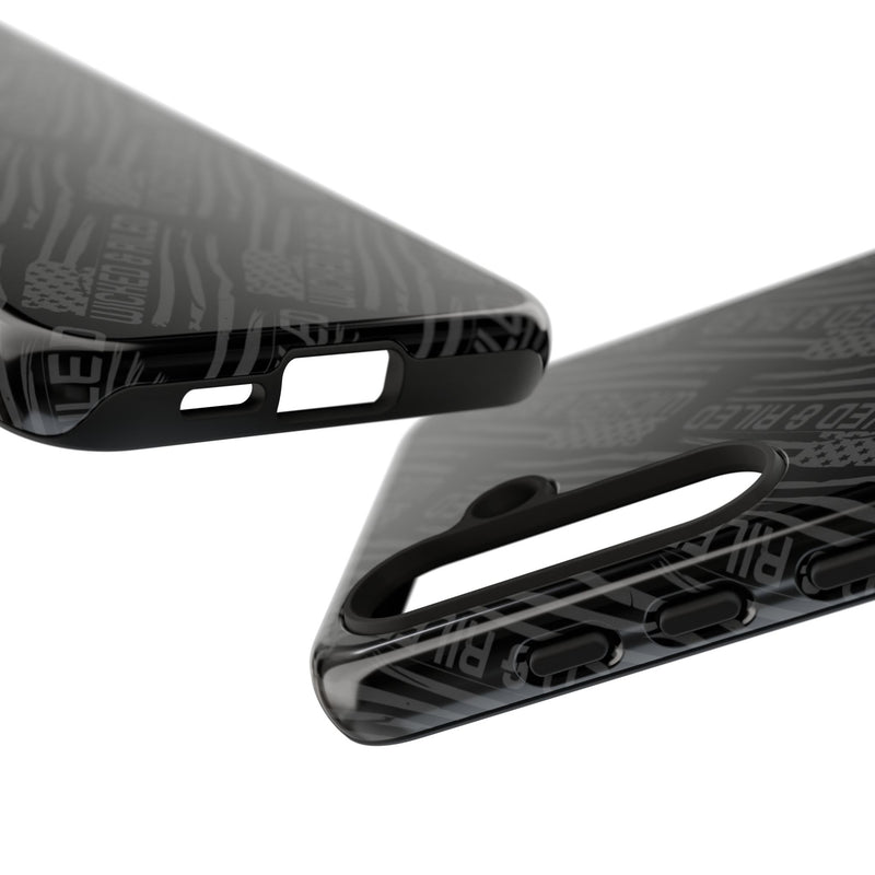 Rugged black protective phone case with "TOUGH CASES" text pattern by Printify, showcasing its durable design.