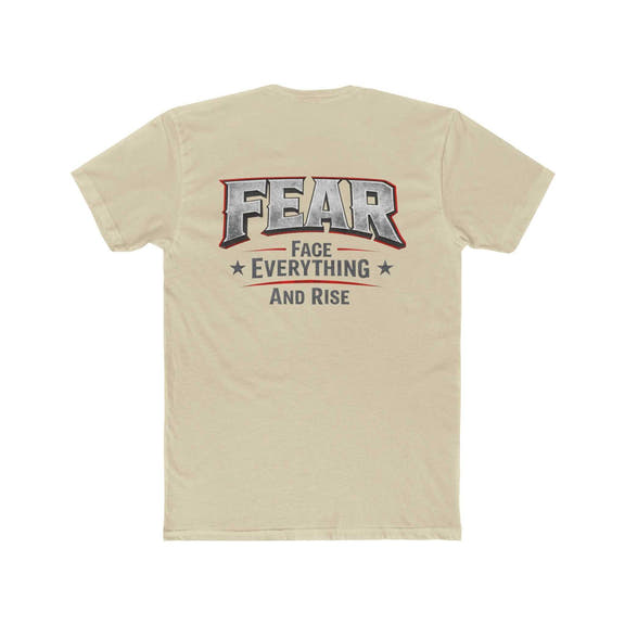 White FEAR Face Everything And Rise T-Shirt by Printify displayed on a hanger against a neutral background.