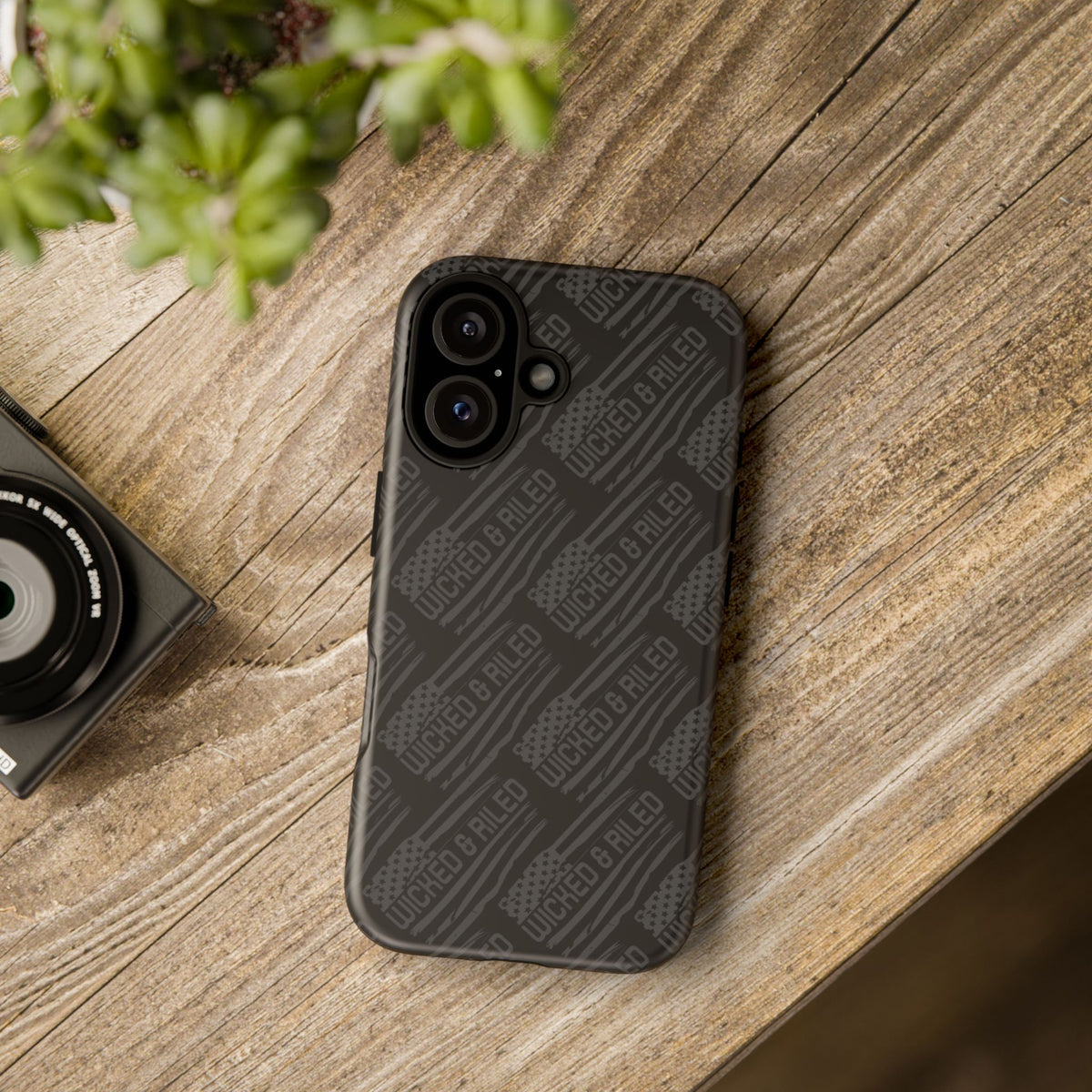 Rugged black protective phone case with "TOUGH CASES" text pattern from Printify, designed for durability and style.
