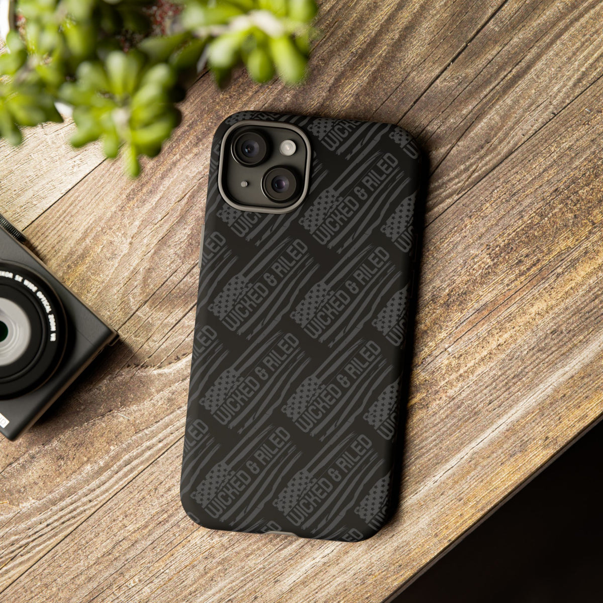 Rugged black protective phone case by Printify featuring a textured "TOUGH CASES" pattern for added grip and durability.