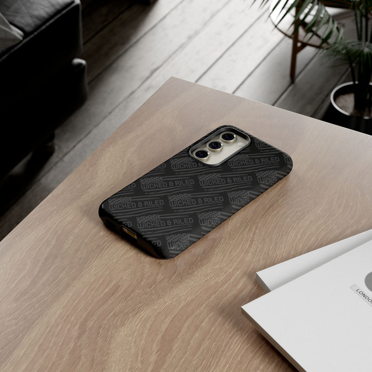 Rugged black protective phone case by Printify featuring a textured "TOUGH CASES" pattern.