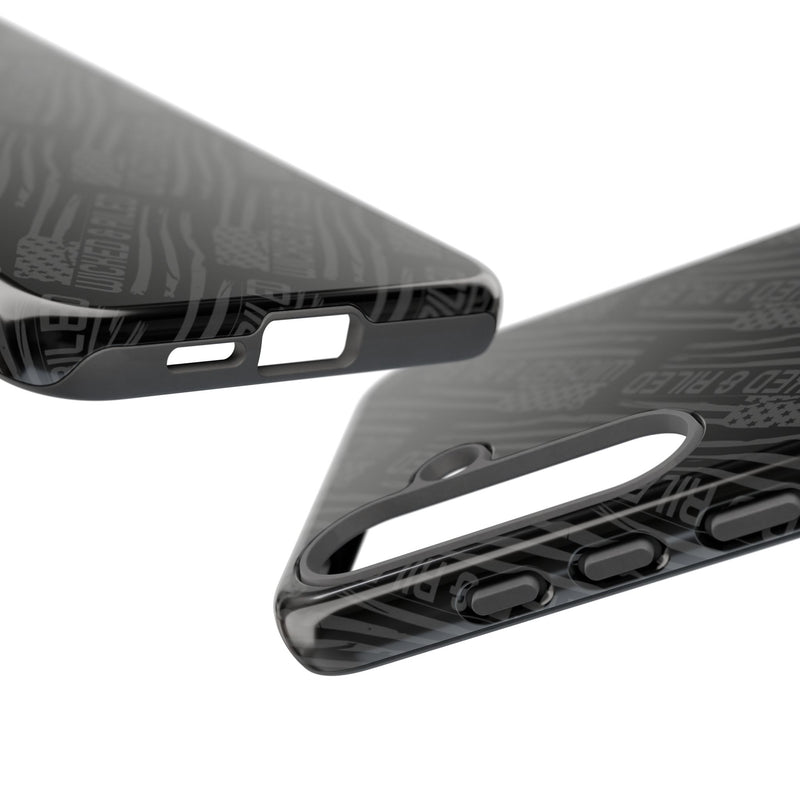Rugged black protective phone case by Printify featuring a textured "TOUGH CASES" pattern for added grip and durability.