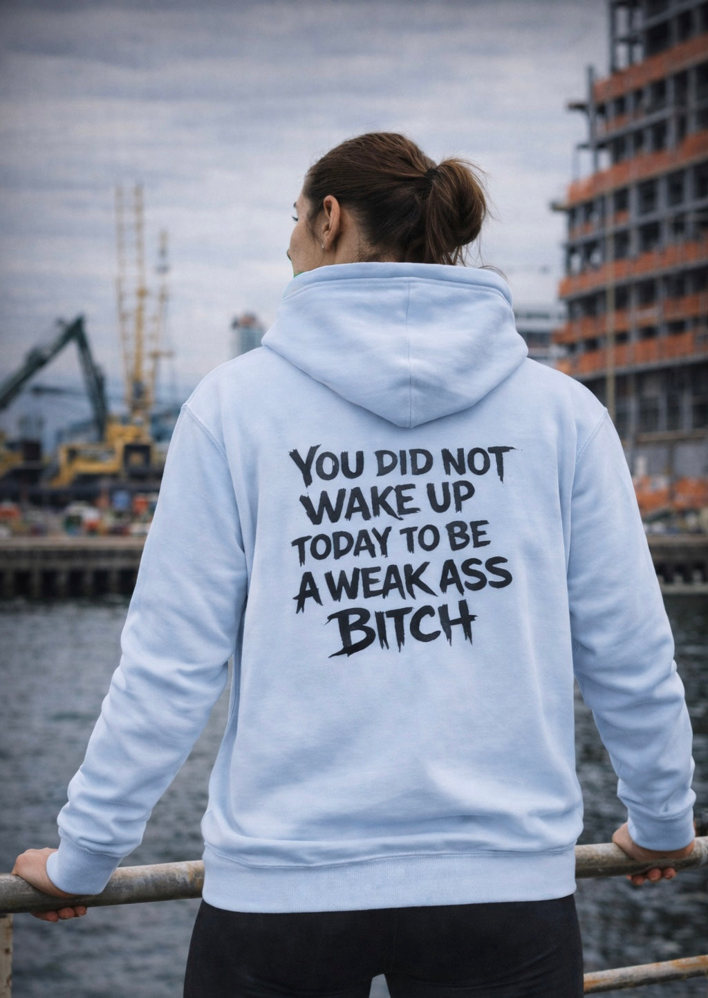 White graphic sweatshirt with bold "You Did Not Wake Up Today to Be a Weak Ass Bitch" motivational text and subtle sleeve design.
