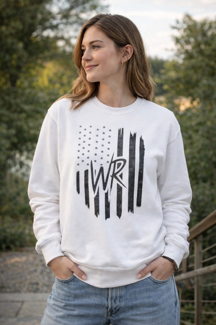 Distressed American flag crewneck sweatshirt with WR monogram, showcasing a patriotic pullover design by Printify.