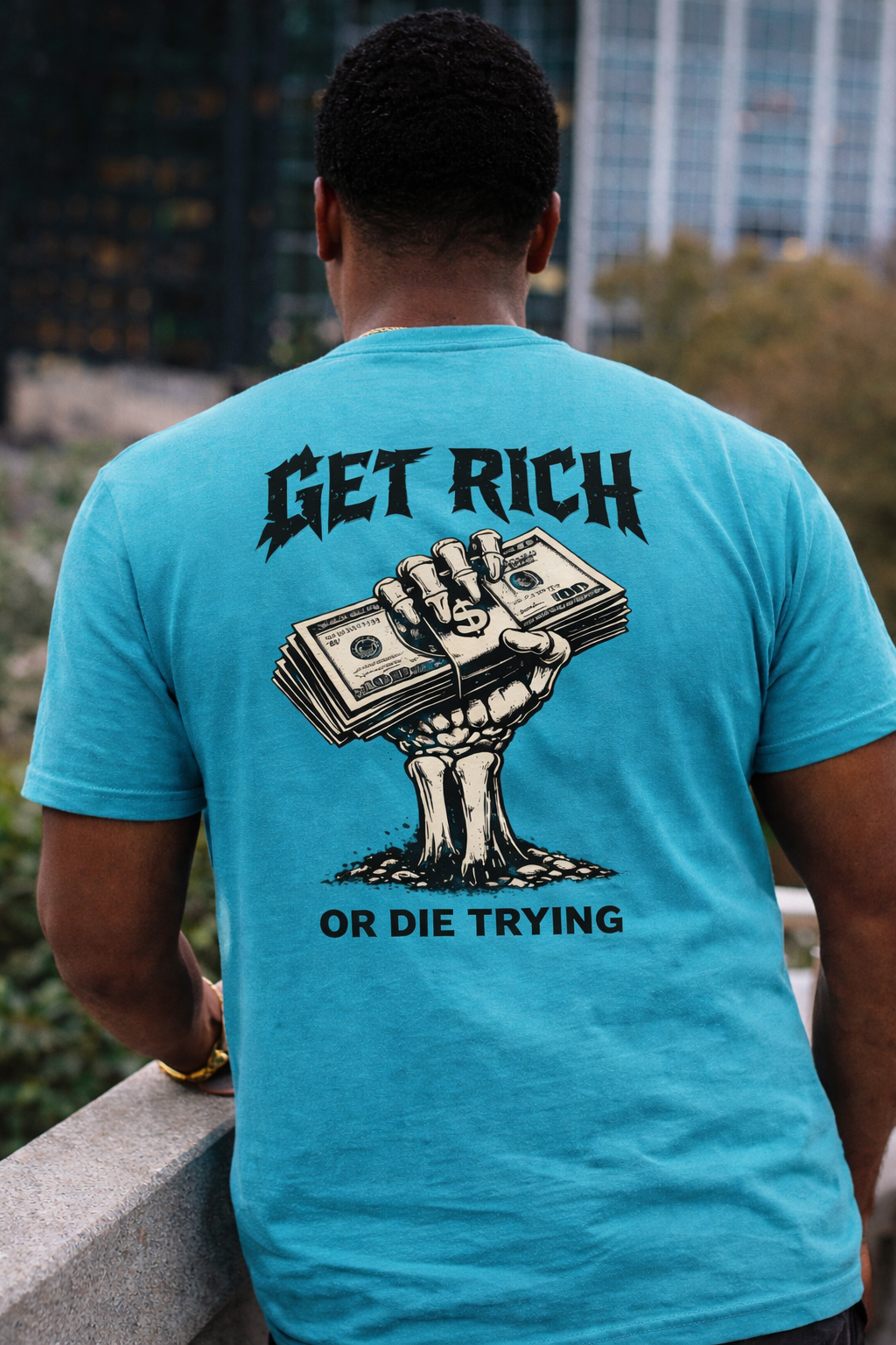 Get Rich or Die Trying graphic t-shirt with skeletal hand and cash illustration on breathable cotton fabric
