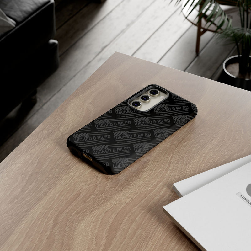 Rugged black protective phone case by Printify featuring a textured "TOUGH CASES" pattern.
