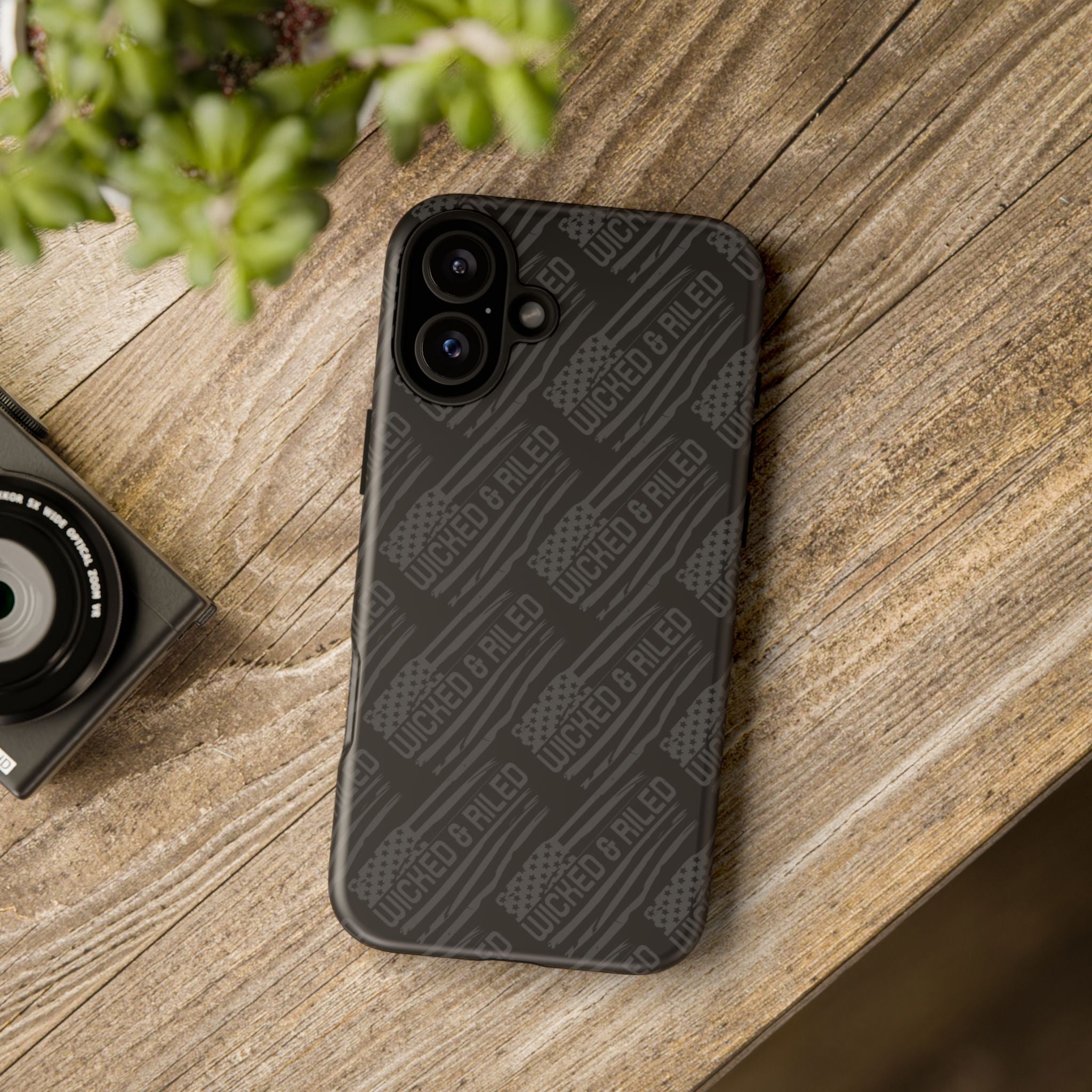Rugged black protective phone case by Printify featuring a textured "TOUGH CASES" pattern.