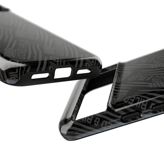 Rugged black protective phone case with "TOUGH CASES" text pattern by Printify, showcasing durable design and texture.