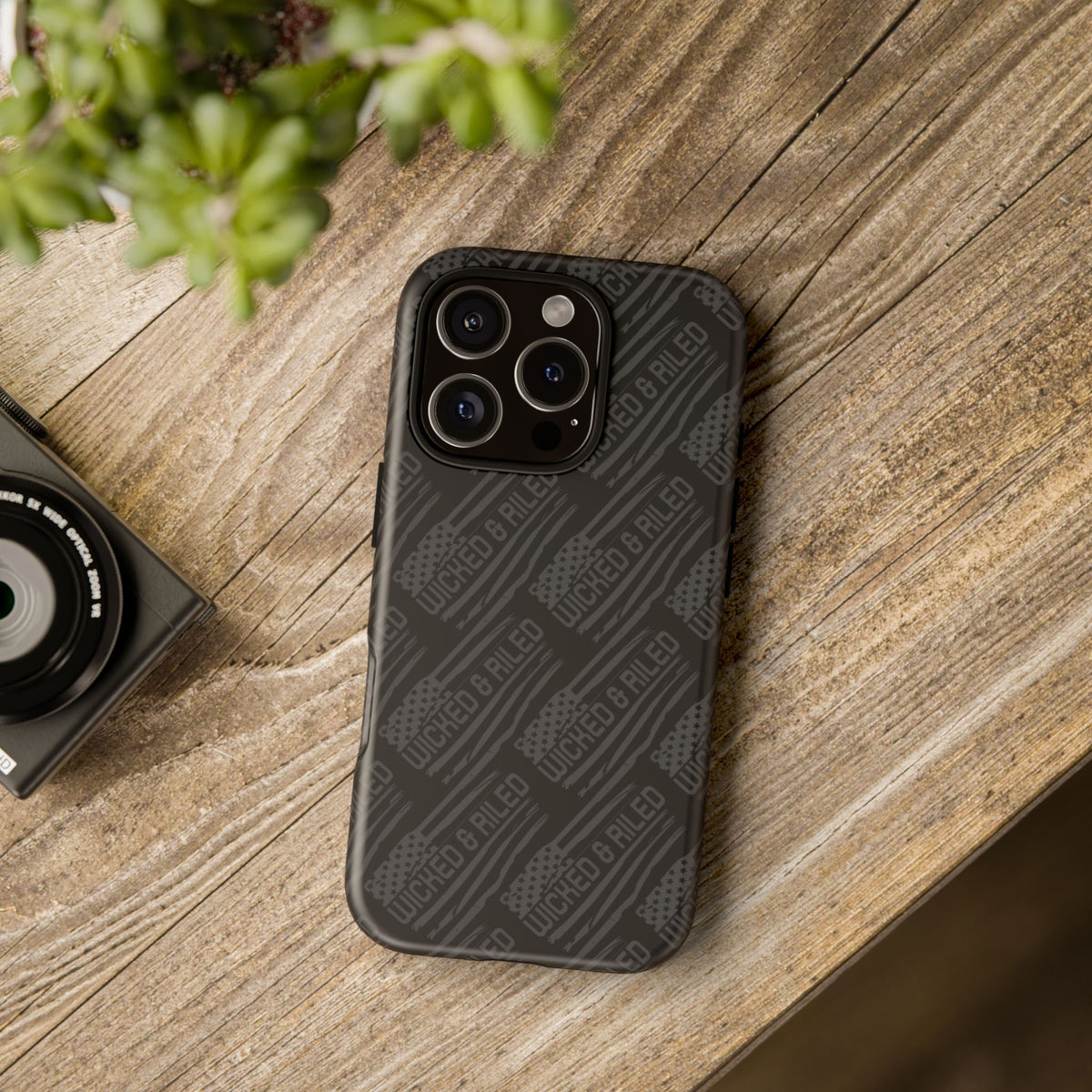 Rugged black protective phone case by Printify with a textured "TOUGH CASES" pattern, designed for durability.