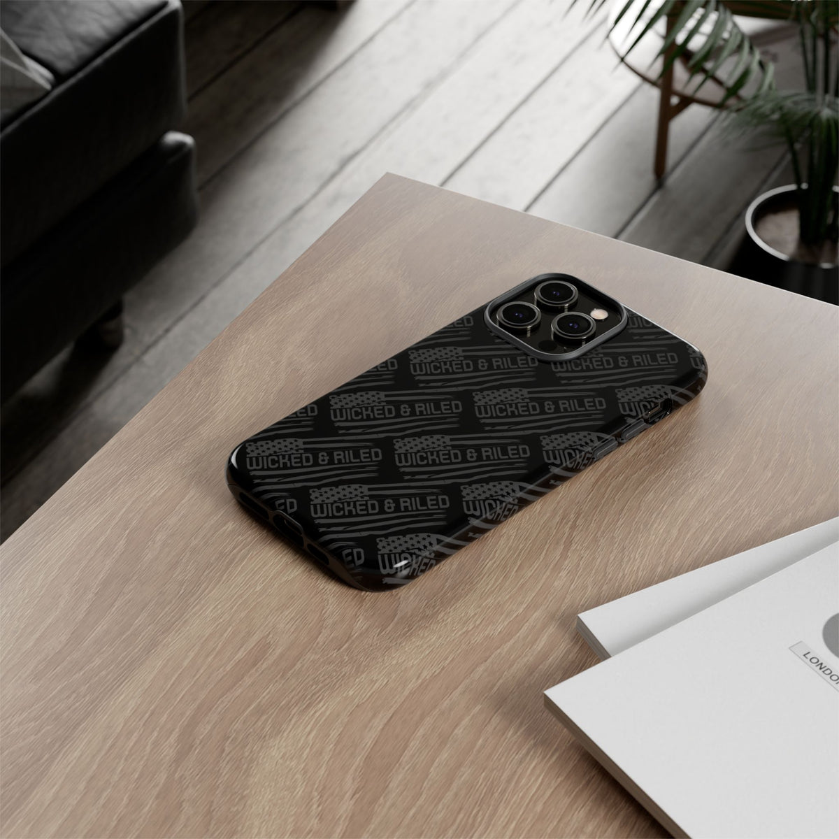 Rugged black protective phone case by Printify with "TOUGH CASES" text pattern, showcasing durable design and texture.