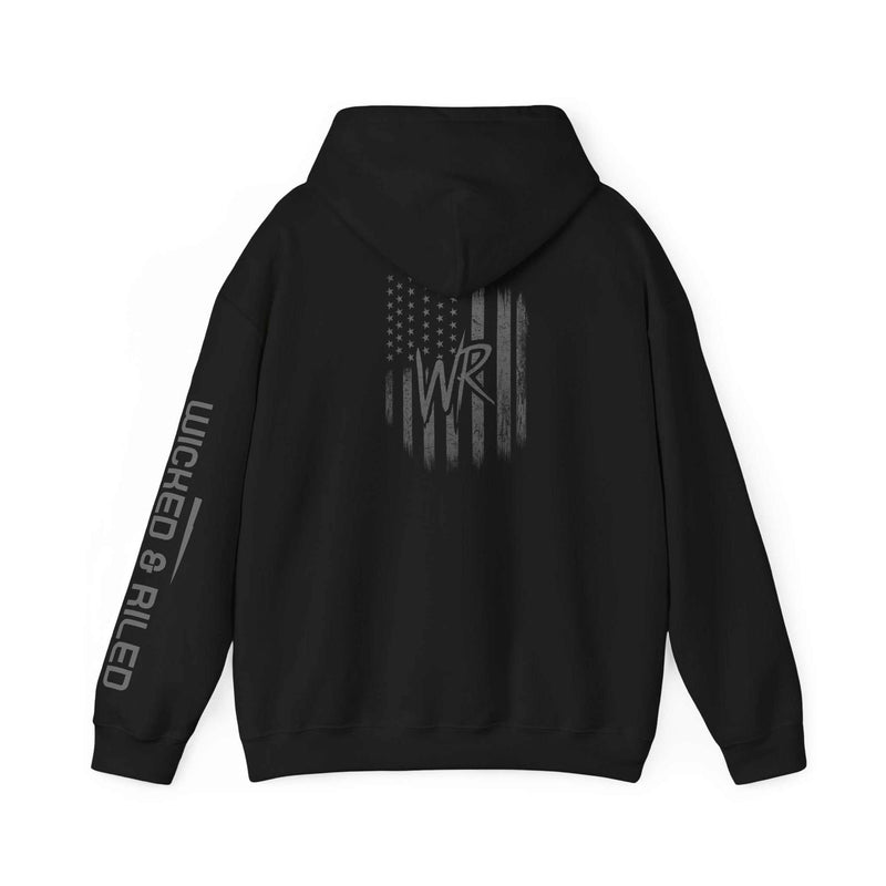 Distressed American logo pullover hoodie by Printify, featuring a cozy design and relaxed fit in a casual setting.