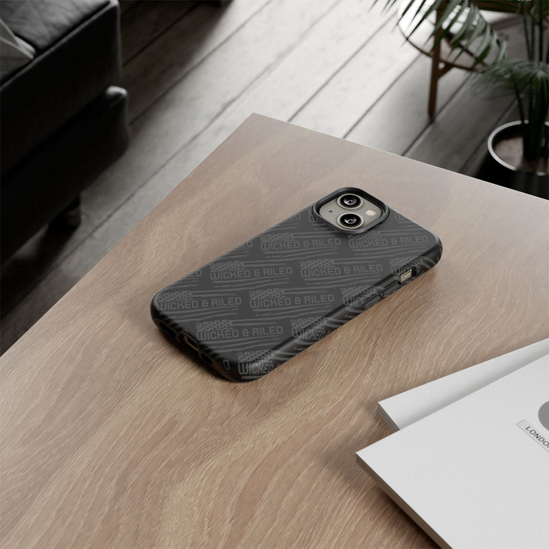 Rugged black protective phone case by Printify with a textured 'TOUGH CASES' pattern for enhanced grip and durability.