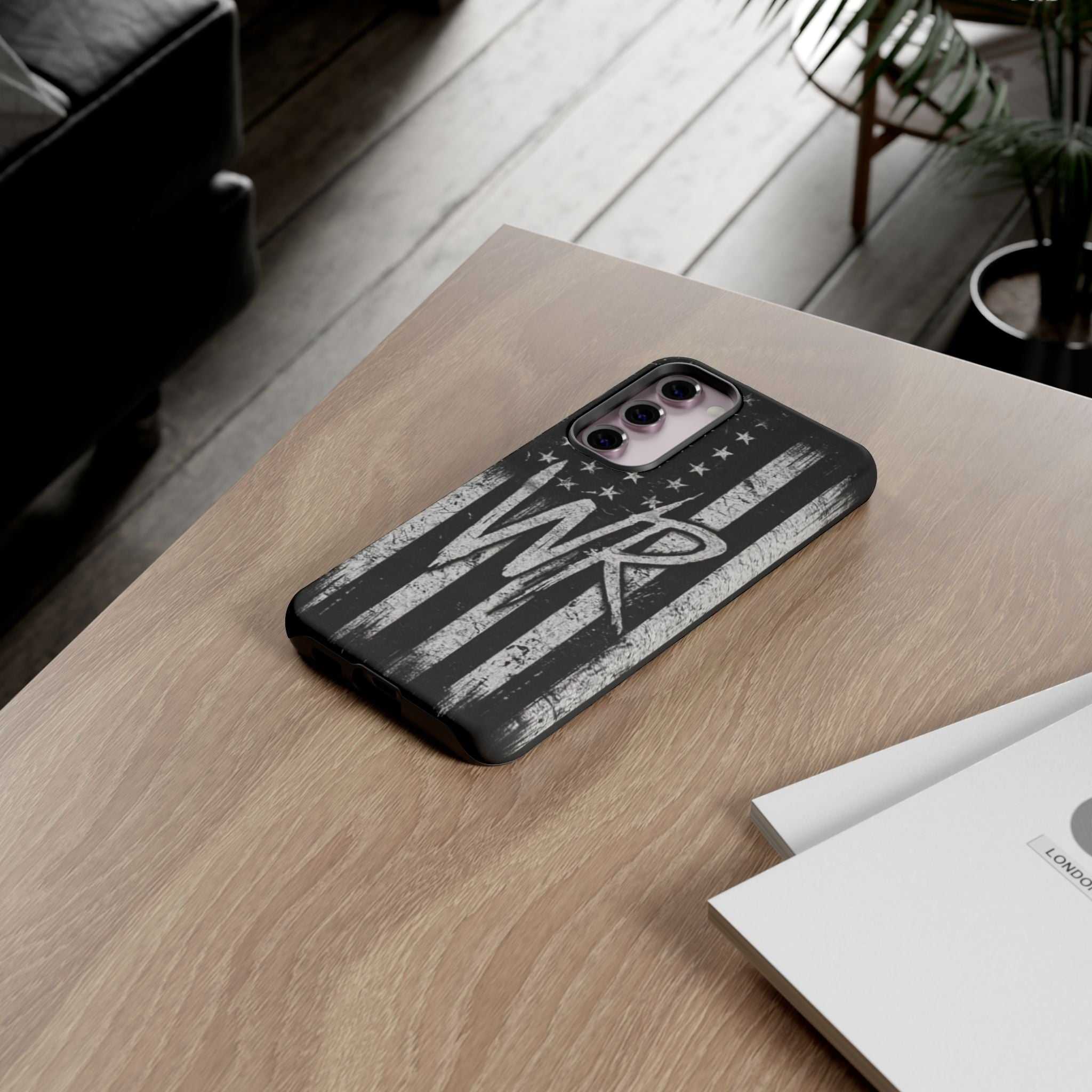 Distressed American flag design on a Patriotic Monogram Tough Phone Case by Printify with initials WR.