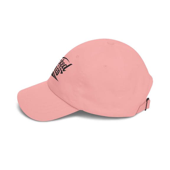 Distressed American flag baseball hat by Printify, featuring a classic dad cap style and adjustable strap.