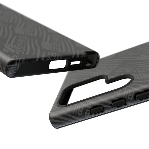 Rugged black protective phone case by Printify featuring a "TOUGH CASES" text pattern on a textured surface.