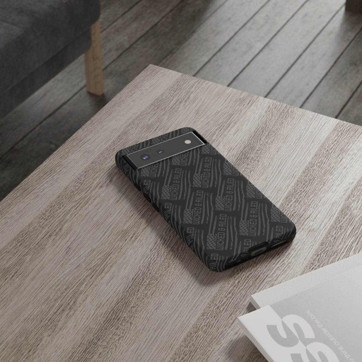 Rugged black protective phone case by Printify with a textured "TOUGH CASES" pattern for added grip and durability.