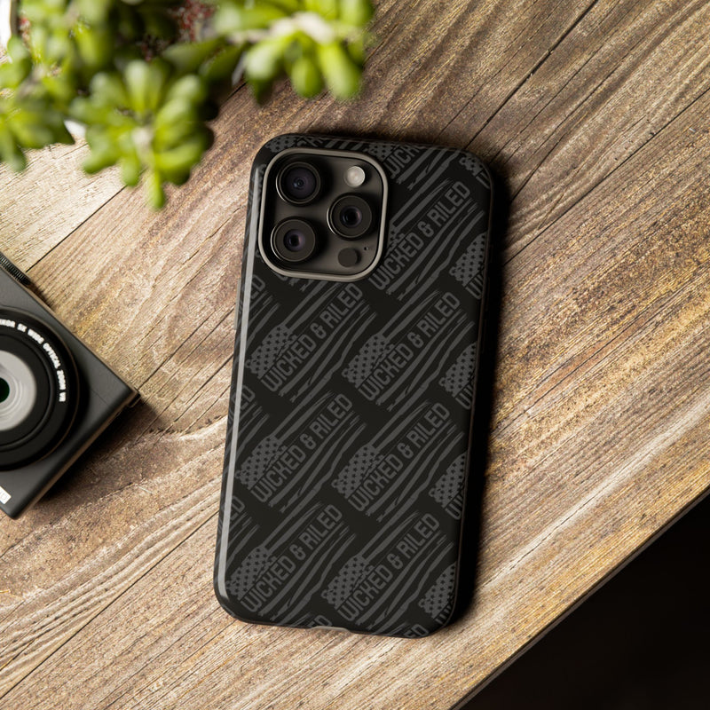 Rugged black protective phone case by Printify featuring a textured TOUGH CASES pattern for enhanced grip and durability.