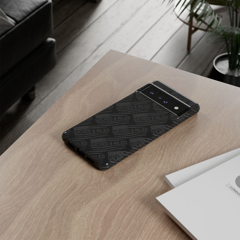 Rugged black protective phone case by Printify featuring a textured 'TOUGH CASES' pattern for enhanced grip and durability.