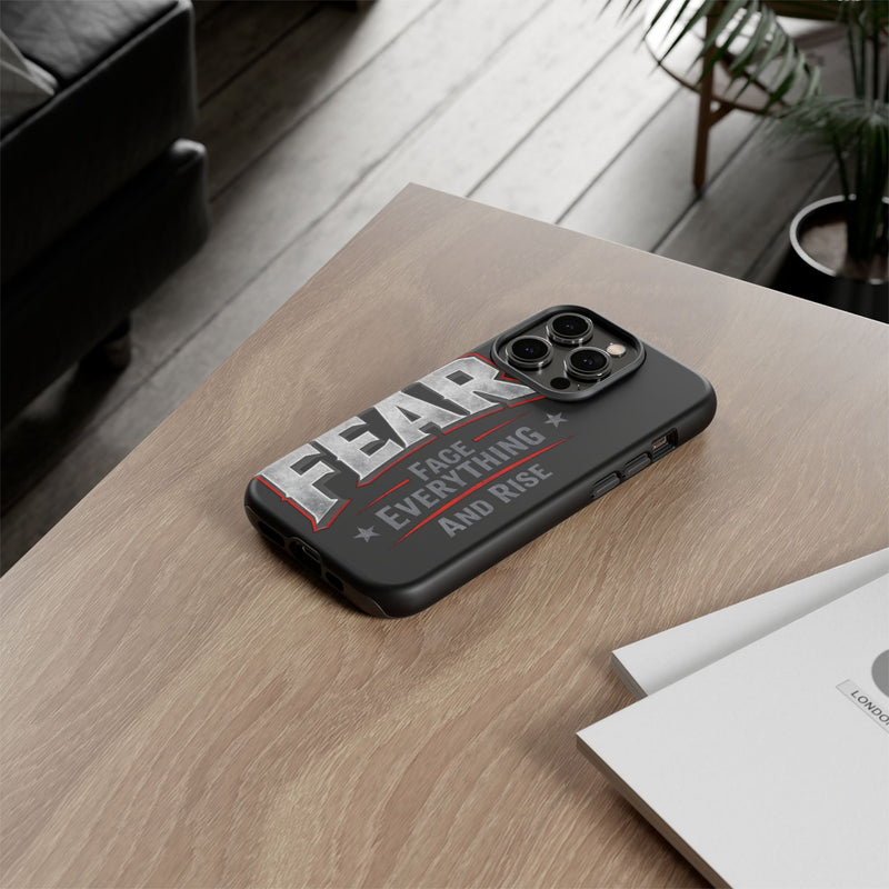 Fear phone case by Printify featuring a motivational quote "Face Everything and Rise" on a sleek design.